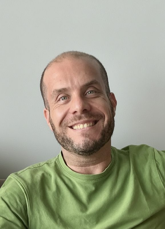 Mario Ferrer, casual portrait in a green shirt